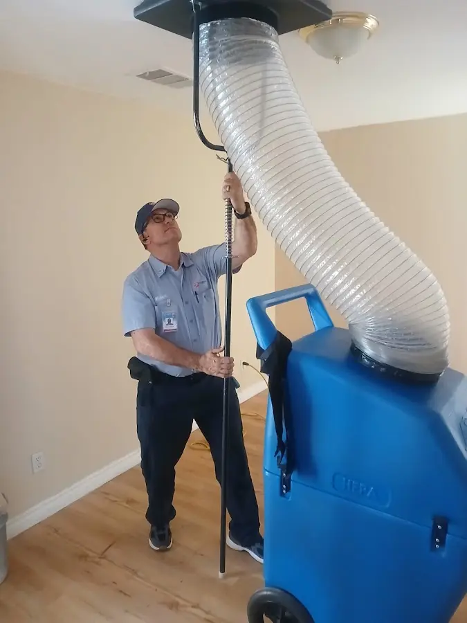 Mini Split Installation technician using HEPA equipment in West Pensacola